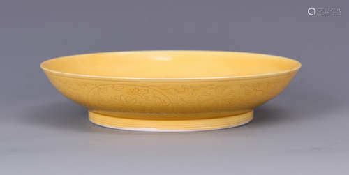 YELLOW GLAZED AND IMPRESSED 'FLOWERS' DISH