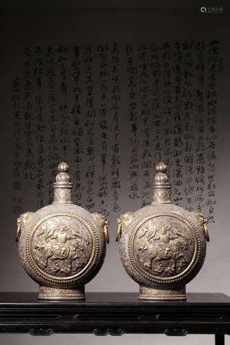 PAIR OF SILVER FILIGREE AND CAST 'PEOPLE' VASES WITH LOOP RING LION MASK HANDLES