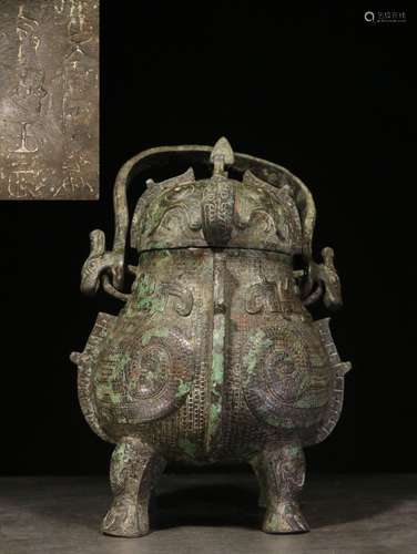 ARCHAIC BRONZE CAST BULBOUS FOUR-LEG VESSEL WITH INSCRIPTION AND LID