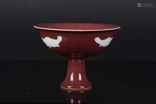 RED GROUND AND WHITE GLAZED STEM CUP