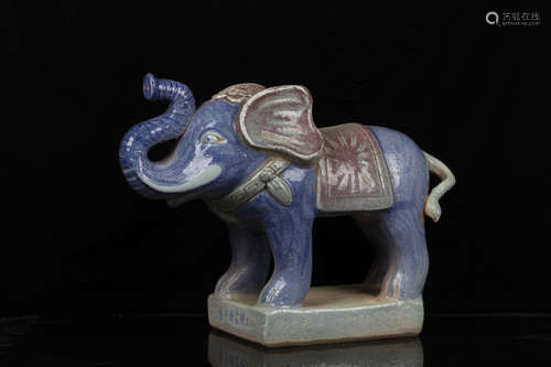 BLUE GLAZED AND CARVED 'ELEPHANT' FIGURE