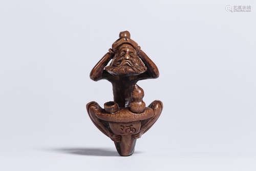 WALNUT CARVED 'ELDER AND WINE' FIGURE