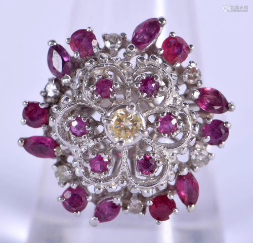 A 14CT GOLD RUBY AND DIAMOND CLUSTER RIN…