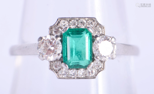 A FINE ART DECO PLATINUM EMERALD AND DIA…