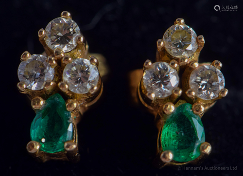 A PAIR OF GOLD DIAMOND AND EMERALD EA…