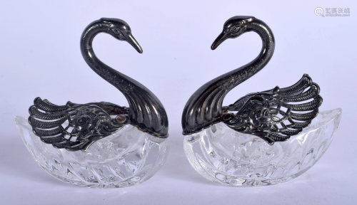 A PAIR OF SILVER AND CUT GLASS SWAN SALTS. 8 c…