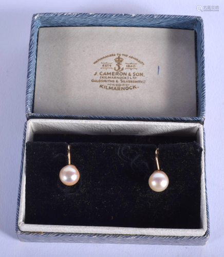 A PAIR OF EDWARDIAN GOLD AND PEARL EARRINGS.…