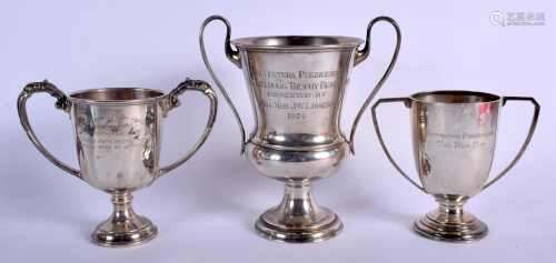 THREE VINTAGE SILVER DOG TROPHIES including the …