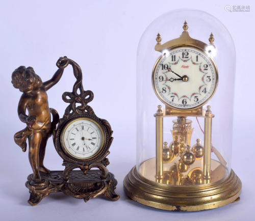 AN ANTIQUE SPELTER DESK CLOCK together with an