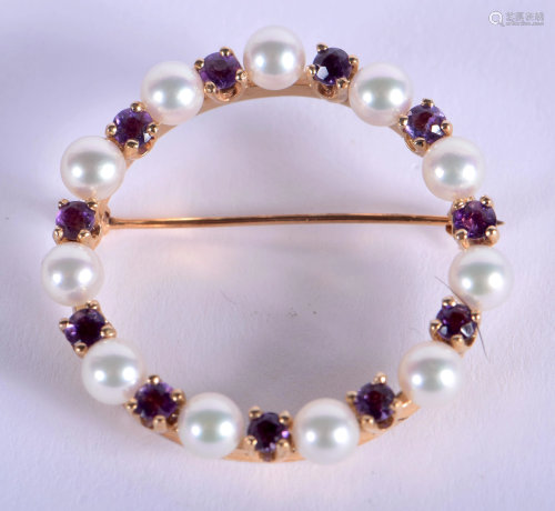 AN EDWARDIAN GOLD PEARL AND AMETHYST BROO…