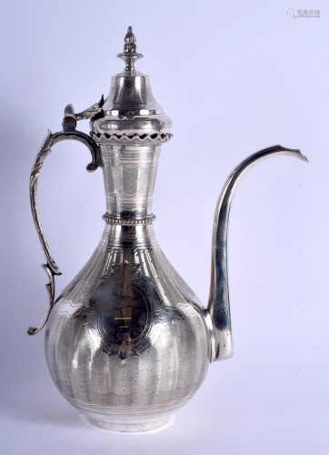 A GOOD LARGE MIDDLE EASTERN TURKISH SILVER EWER