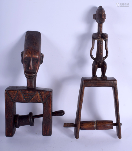 TWO AFRICAN TRIBAL CARVED WOOD PULLEYS. Lar…