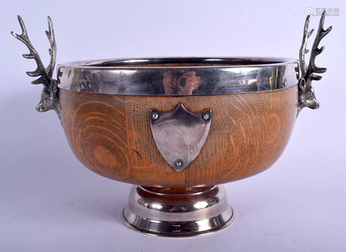 AN EDWARDIAN SILVER PLATED OAK MONTEITH TYPE …