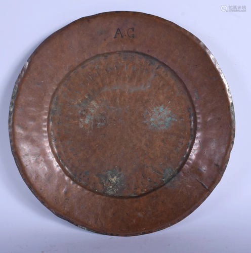 AN ARTS AND CRAFTS BEATEN COPPER DISH initialle…