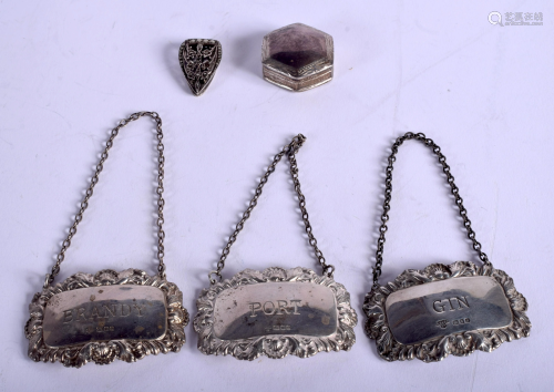THREE SILVER DECANTER LABELS together with a silver
