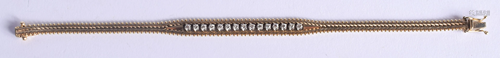 AN ITALIAN 14CT GOLD AND DIAMOND BRACELET. 1…