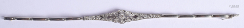 AN ANTIQUE WHITE GOLD AND DIAMOND BRACE…