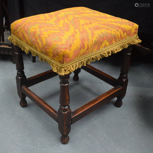 A 17TH/18TH CENTURY OAK JOINT STOOL with uph…