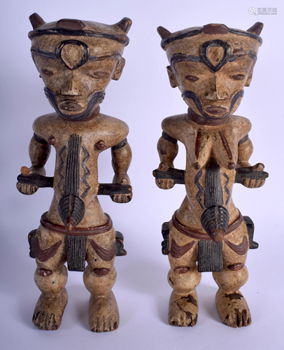 A PAIR OF EARLY 20TH CENTURY AFRICAN PAINTED …