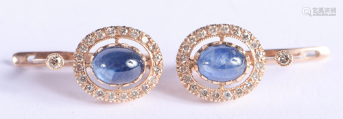 A PAIR OF 14CT GOLD DIAMOND AND SAPPHIRE EA…