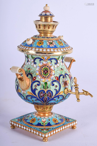 A CONTINENTAL SILVER AND ENAMEL SAMOVAR pain…