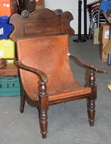 A 19TH CENTURY COLONIAL LEATHER BACK PL…