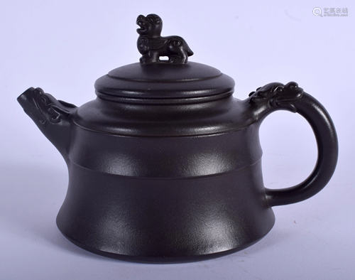 A CHINESE YIXING POTTERY TEAPOT AND COVE…