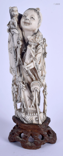 A 19TH CENTURY CHINESE CARVED BONE FIG…