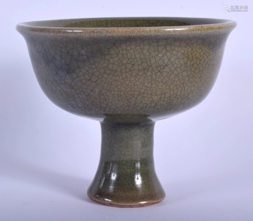 A 19TH CENTURY CHINESE GREEN GLAZED STE…