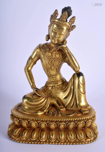 A CHINESE GILT BRONZE FIGURE OF A SEATE…