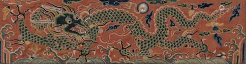 A Chinese Embroidered Silk Fragmentary Dragon Panel