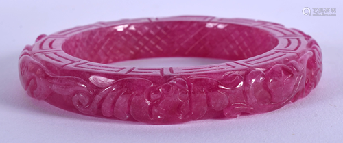 A CHINESE PINK JADE BANGLE 20th Century. 8 cm …