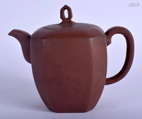 A CHINESE YIXING POTTERY TEAPOT AND COVE…