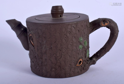 A CHINESE YIXING POTTERY TEAPOT AND COVE…