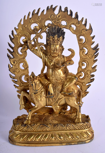 A CHINESE GILT BRONZE FIGURE OF A BUDD…