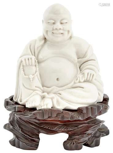 A Chinese Dehua Porcelain Figure of Budai