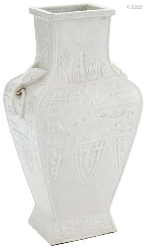 A Chinese Carved and White Glazed Paste Porcelain Vase