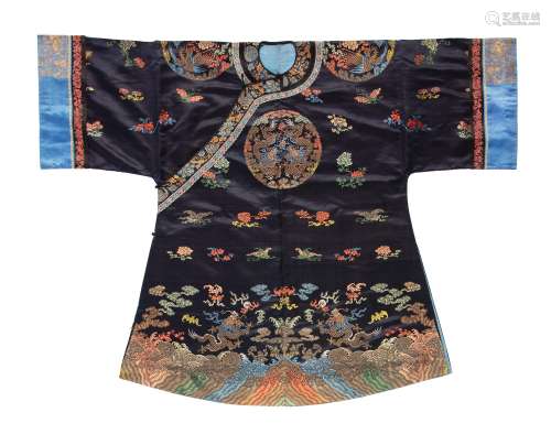 A BLUE-GROUND SILK BROCADE LADY’S INFORMAL COURT ROBE, LATE QING DYNASTY