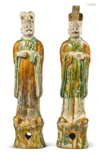A PAIR OF SANCAI-GLAZED POTTERY FIGURES OF OFFICIALS , TANG DYNASTY
