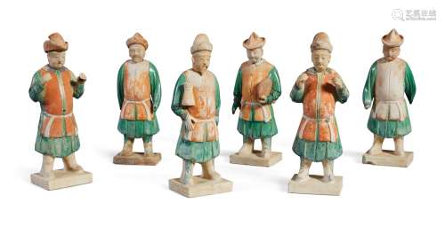 A SET OF SIX GLAZED AND PAINTED POTTERY FIGURES OF ATTENDANTS,  MING DYNASTY