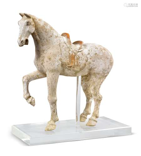 A LARGE PAINTED POTTERY FIGURE OF A PRANCING HORSE, TANG DYNASTY