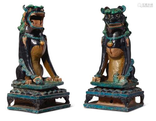 A PAIR OF MASSIVE FAHUA-GLAZED FIGURES OF SEATED LIONS, QING DYNASTY