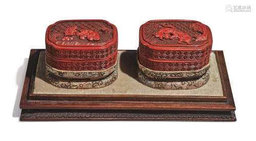 A PAIR OF CARVED CINNABAR LACQUER QUATREFOIL BOXES AND COVERS, QING DYNASTY, 18TH CENTURY