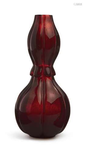 A LOBED GARNET-RED GLASS DOUBLE-GOURD VASE, QING DYNASTY