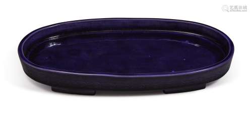 AN AUBERGINE-GLAZED OVAL FOOTED TRAY,  QING DYNASTY, 19TH CENTURY