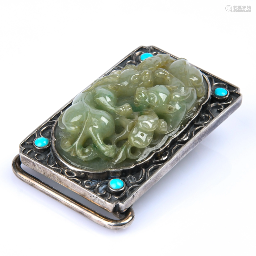 A Chinese Caved Jadeite Buckle