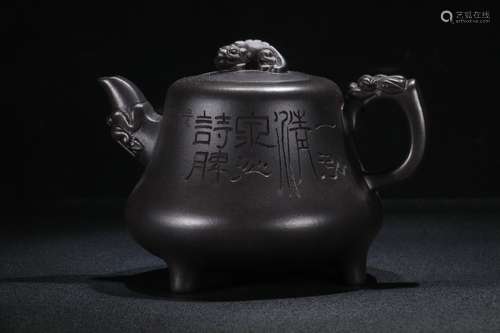 A Zisha Teapot With Dragon Carving And Marking