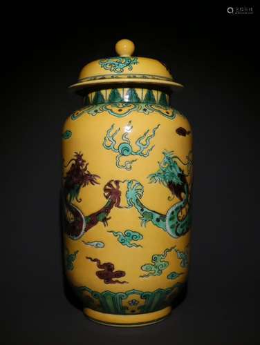 A Chinese Porcelain Jar With Dragon Carving