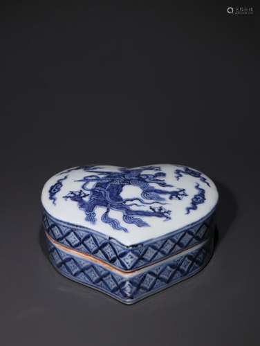 A Chinese Porcelain Box With Dragon Carving