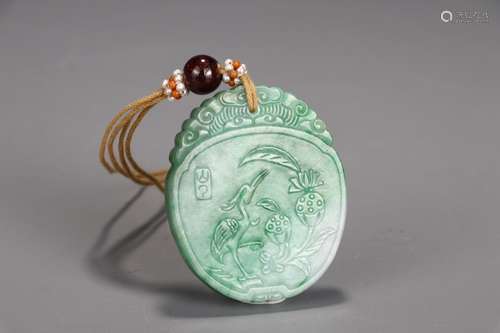 A Chinese Jadeite Pendant With Auspicious Meaning